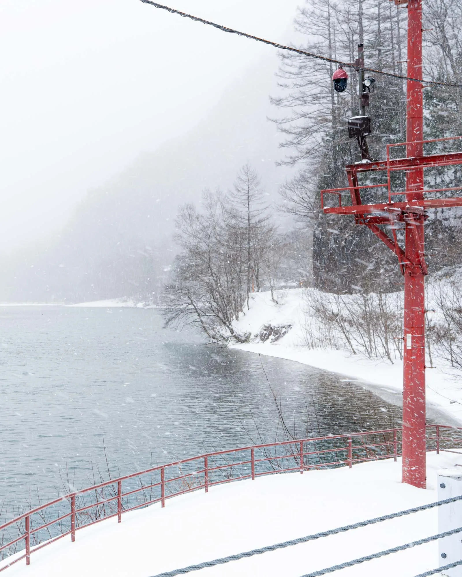 kamikochi winter taisho pond red post